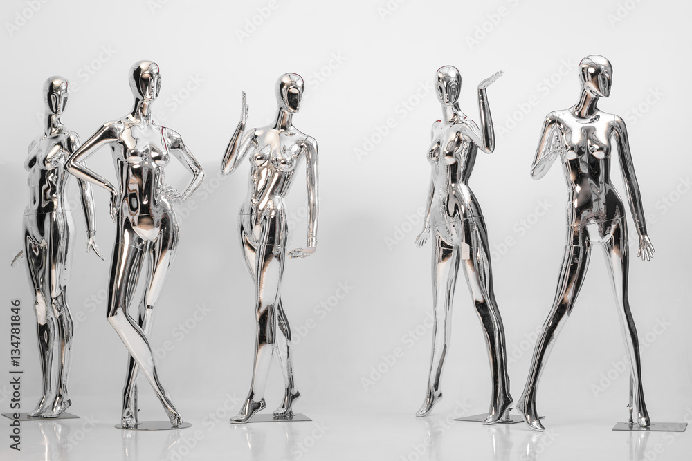 many fashion shiny female mannequins for clothes. Metallic manne - obrazy, fototapety, plakaty 