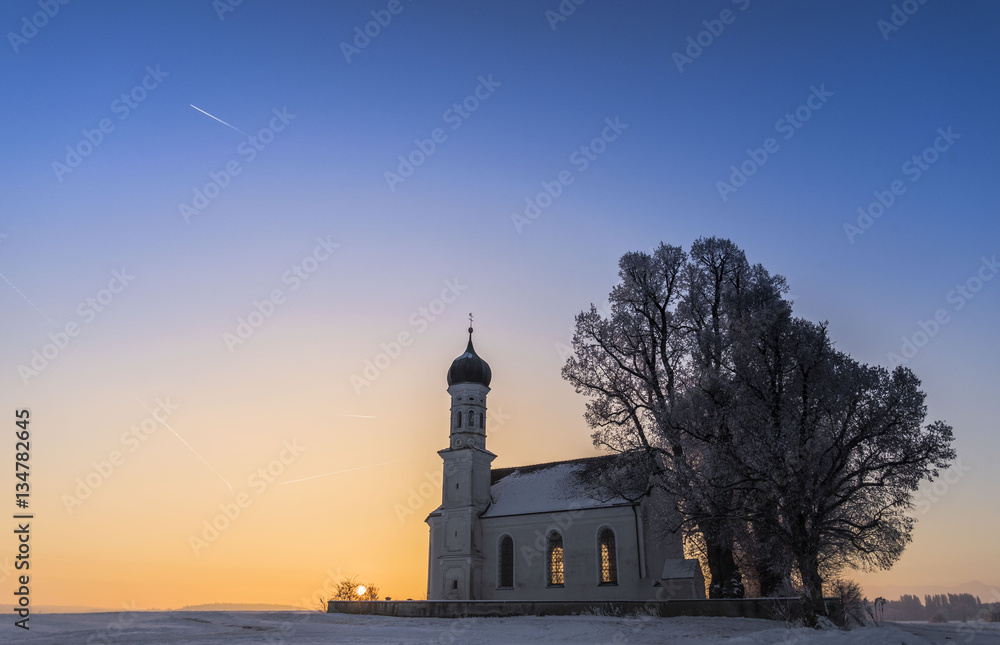 Winter sunrise near the catolic church, fantastic nature landscape, wallpaper