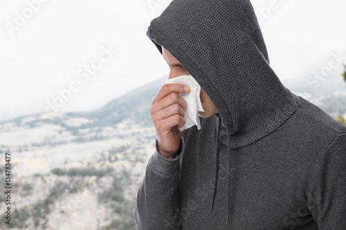 Man caught cold , flu, running nose. Healthcare and medical concept