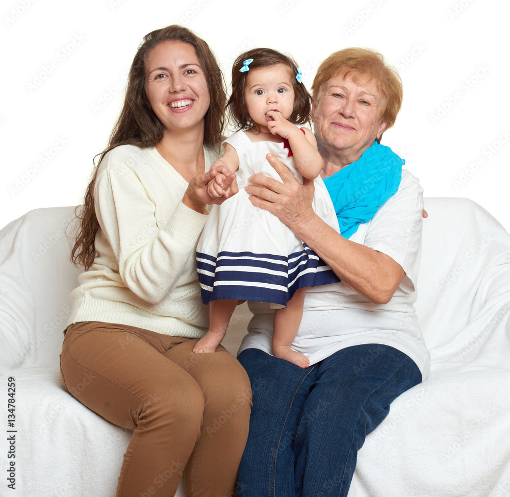 Family portrait on white background, happy people sit on sofa. Children with mother and grandmother Family portrait on white background, happy people sit on sofa. Children with mother and grandmother