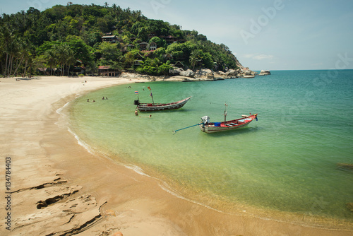 beautiful tropical beach with boats