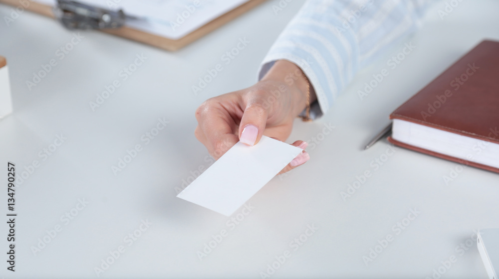 Close-up of business card in women hand Close-up of business card in women hand