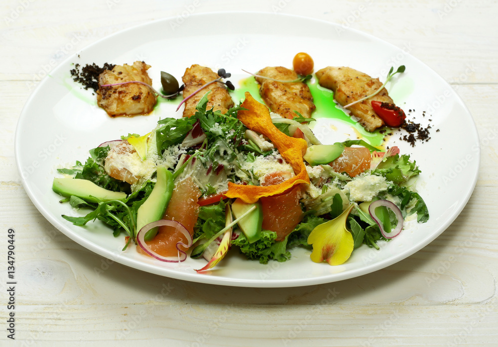 Fried fish and green salad Fried fish and green salad