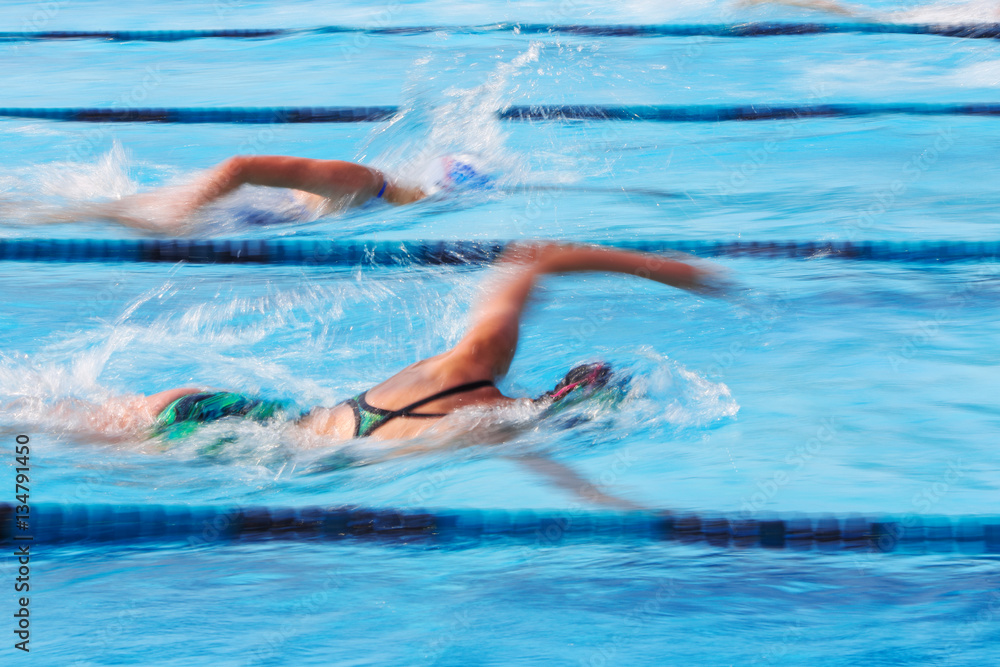 Freestyle swimmer.  Motion blurred image