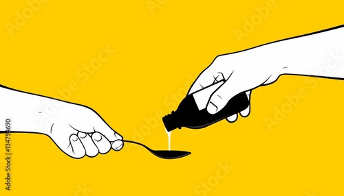 Hand dropping medicine in a spoon