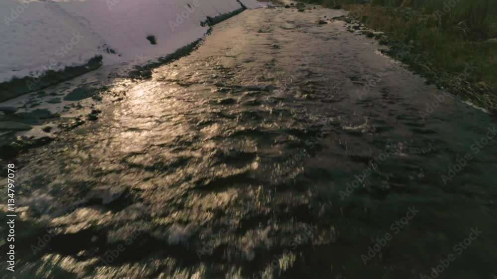 Aerial shot of flying backward over the river Aerial shot of flying backward over the river