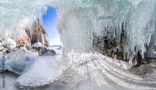 Panorama dawn in an ice cave with icicles on Baikal, Olkhon photo