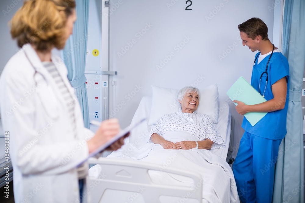 Doctors talking to a senior patient Doctors talking to a senior patient