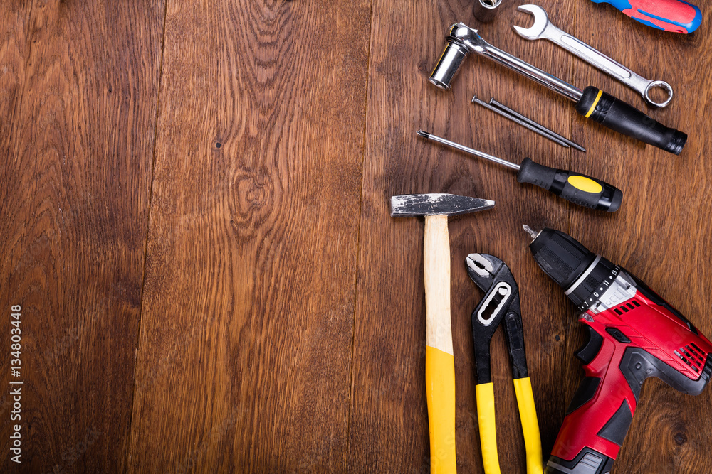 Construction Tools On A Wooden Desk Construction Tools On A Wooden Desk