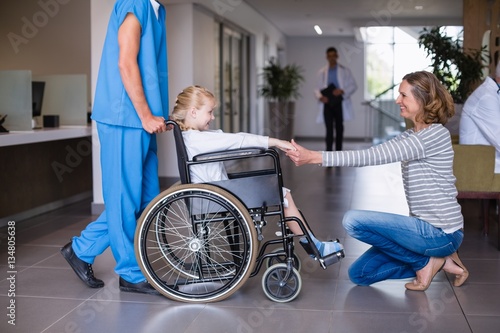Obraz na plátne Happy mother meeting her disable daughter