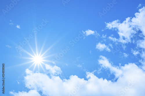 blue sky background with the bright sun