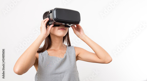 Woman watching though Virtual reality glasses