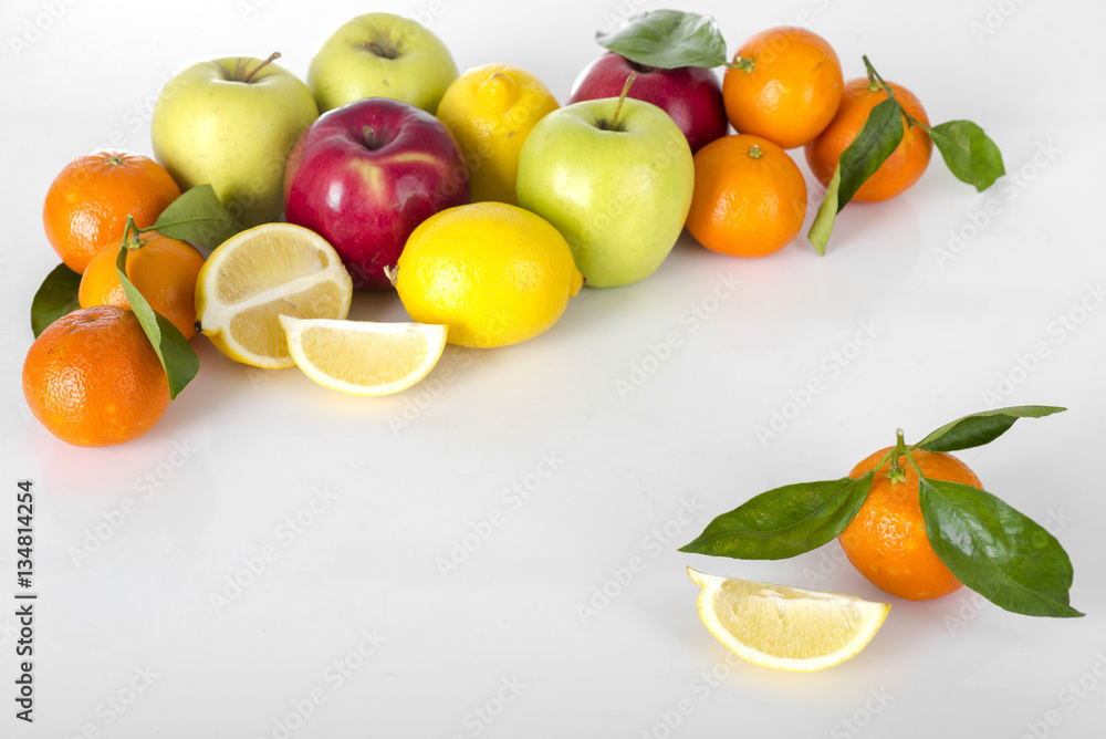 assorted vegetables and fruits, surrounding an empty cutting sur assorted vegetables and fruits, surrounding an empty cutting sur