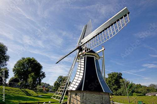 windmill in Dutch landscape