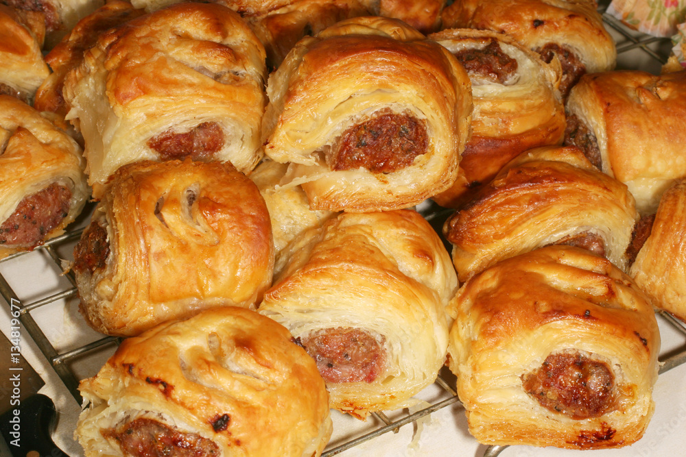 Small home cooked sausage rolls ready to eat.