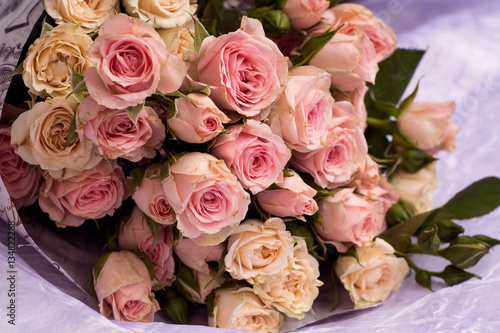 Beautiful wedding bouquet of beige and pink roses