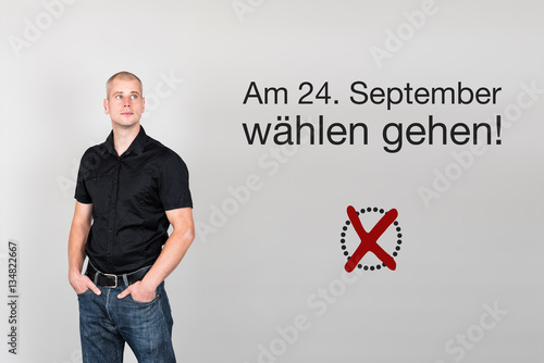 Mann mit Aufruf zum wählen gehen für Bundestagswahl Deutschlan photo