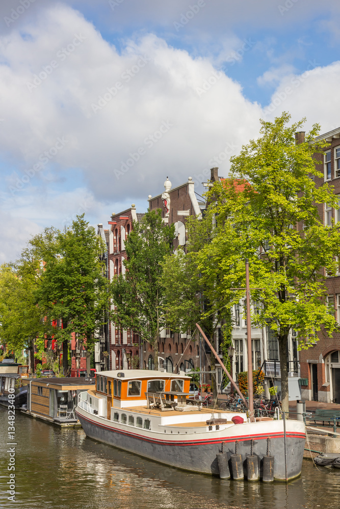 Historical ship in the canals of Amsterdam