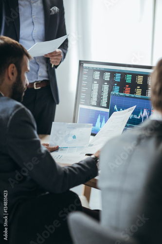 Financial managers working at their office.