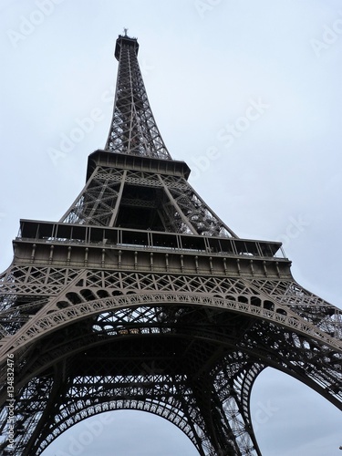 toure eiffel architecture in paris with grey cloud