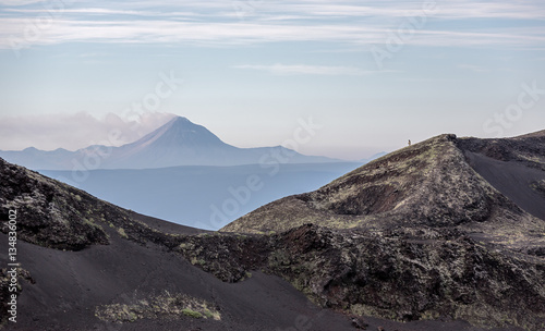 View from the volcanic plateau Tolbachik on the cone of an active volcano Kizimen - Kamchatka, Russia photo