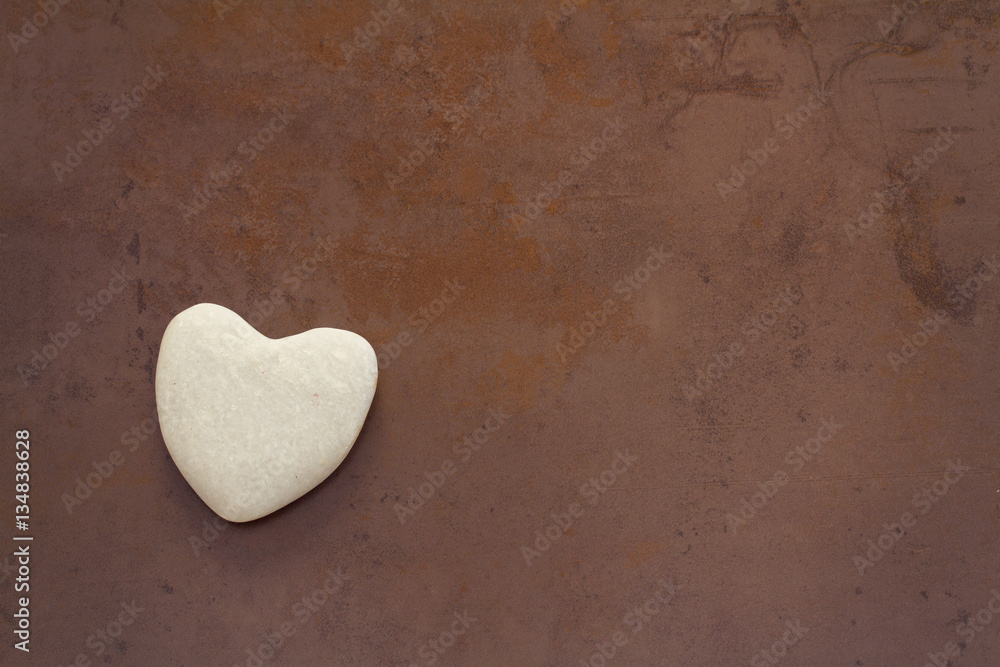 Obraz premium heart on ceramic brown background