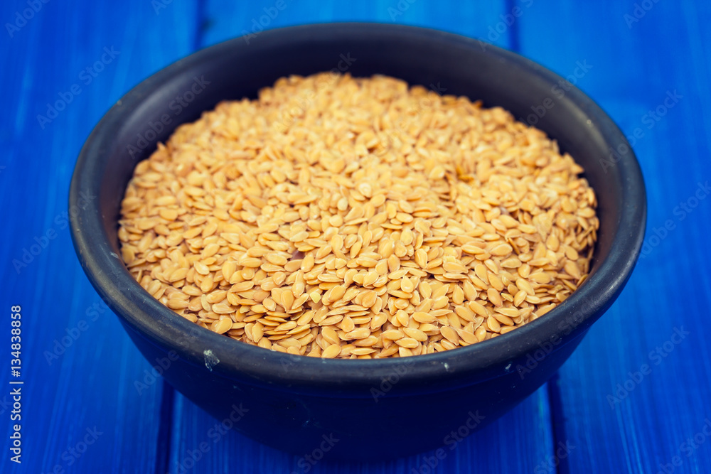 linen seeds in black bowl linen seeds in black bowl