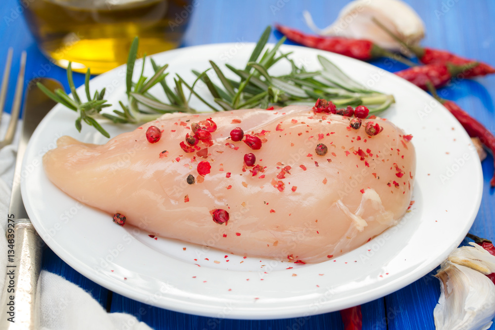 raw chicken with pink pepper and rosemary raw chicken with pink pepper and rosemary