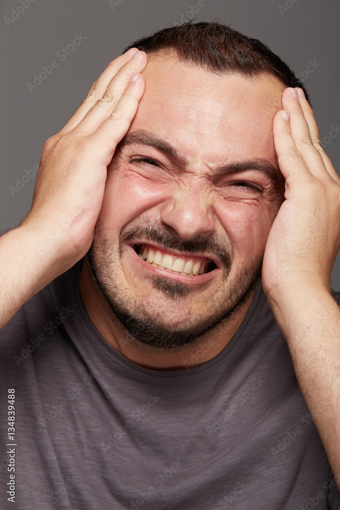sick, stressed man suffers from headache pain sick, stressed man suffers from headache pain