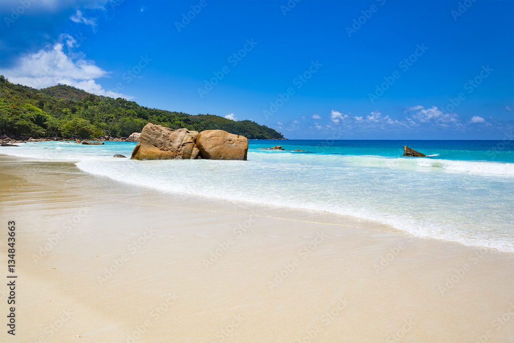 Wide tropical sandy beach, Anse Lazio