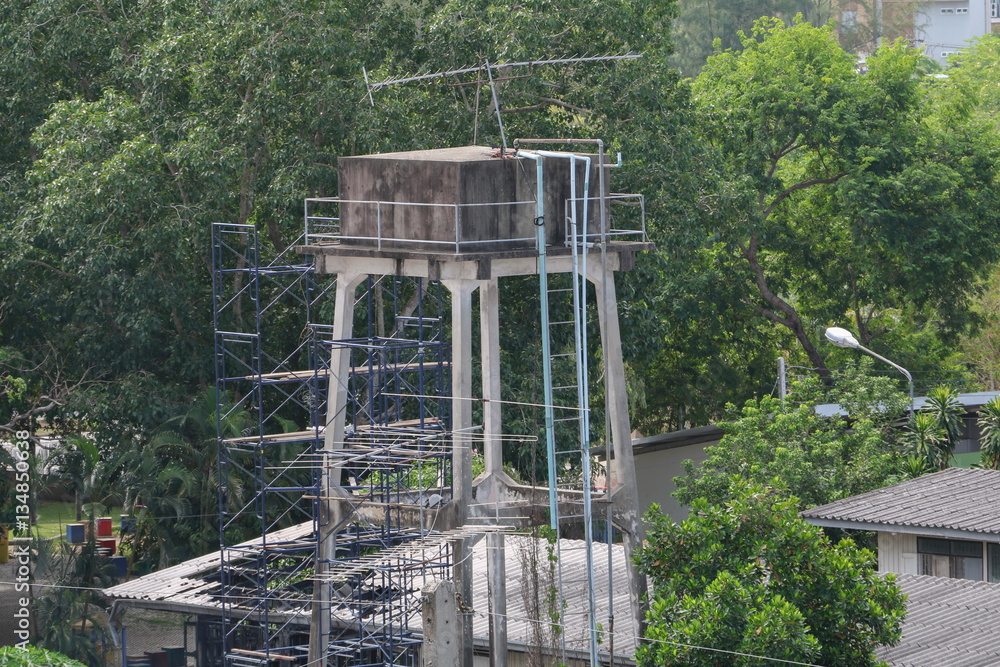 Water supply tank old for agriculture being repair Water supply tank old for agriculture being repair