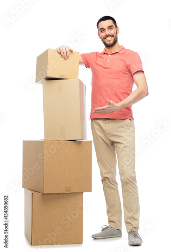 happy man with cardboard boxes
