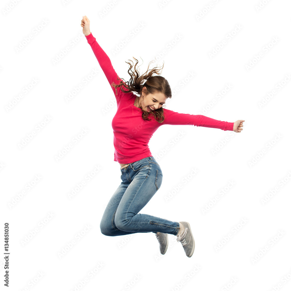 smiling young woman jumping in air