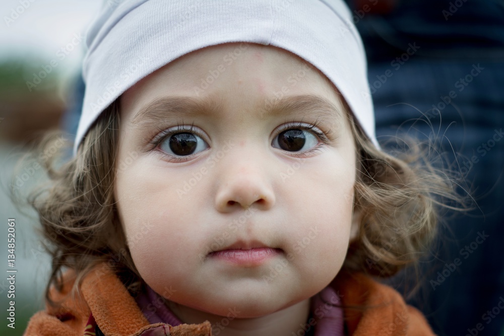 Portrait of a girl 2-3 years. Face close-up.
Portrait of a girl 2-3 years. Face close-up.