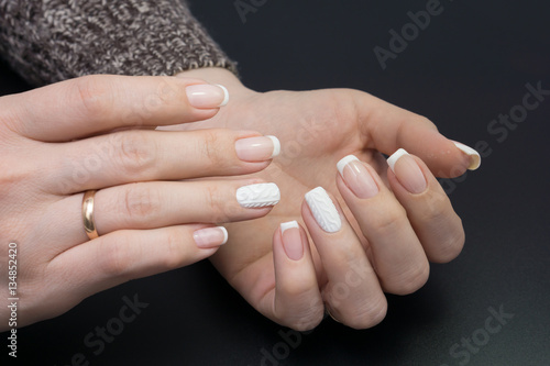 Beautiful hands and natural nails  ideal clean manicure. Decorated with stylish elements