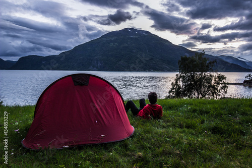 July 23, 2015: Wild camping tent in the village of Ornes, Norway photo