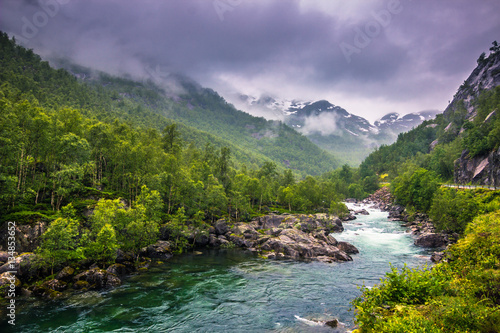 July 21, 2015: Small river in the norwegian countryside, Norway photo