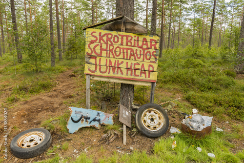 Car Graveyard Sign in Smaland photo