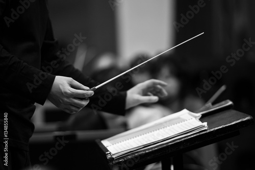  Hands of conductor closeup in black and white photo