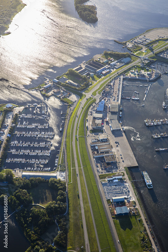 aerial view of an harbour, wtih marina, car park, ferry boat terminal a dike, Friesland, the Netherlands