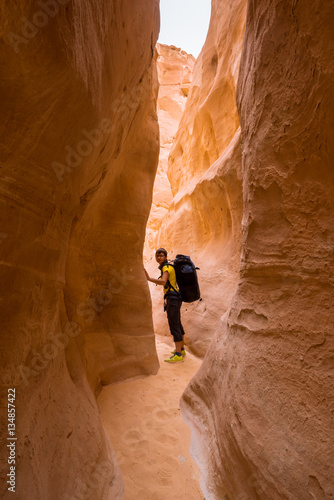 Woman Hiker with backpack enjoy view in desert