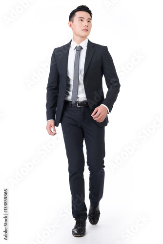 Asian businessman walk