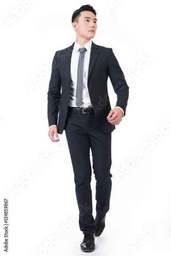 Asian businessman walk