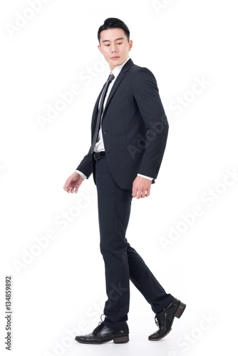 Asian businessman walk