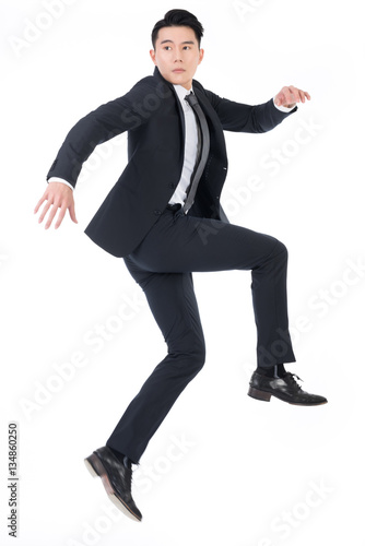 Asian businessman jump © AsianPeopleImages