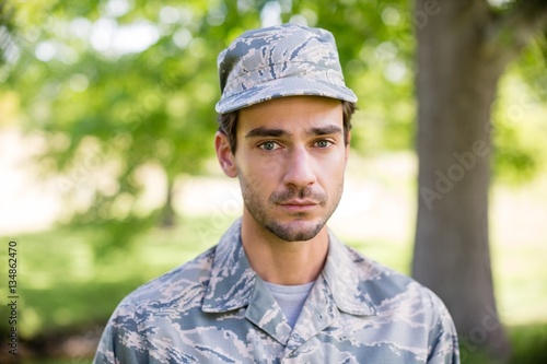 Portrait of soldier standing in park