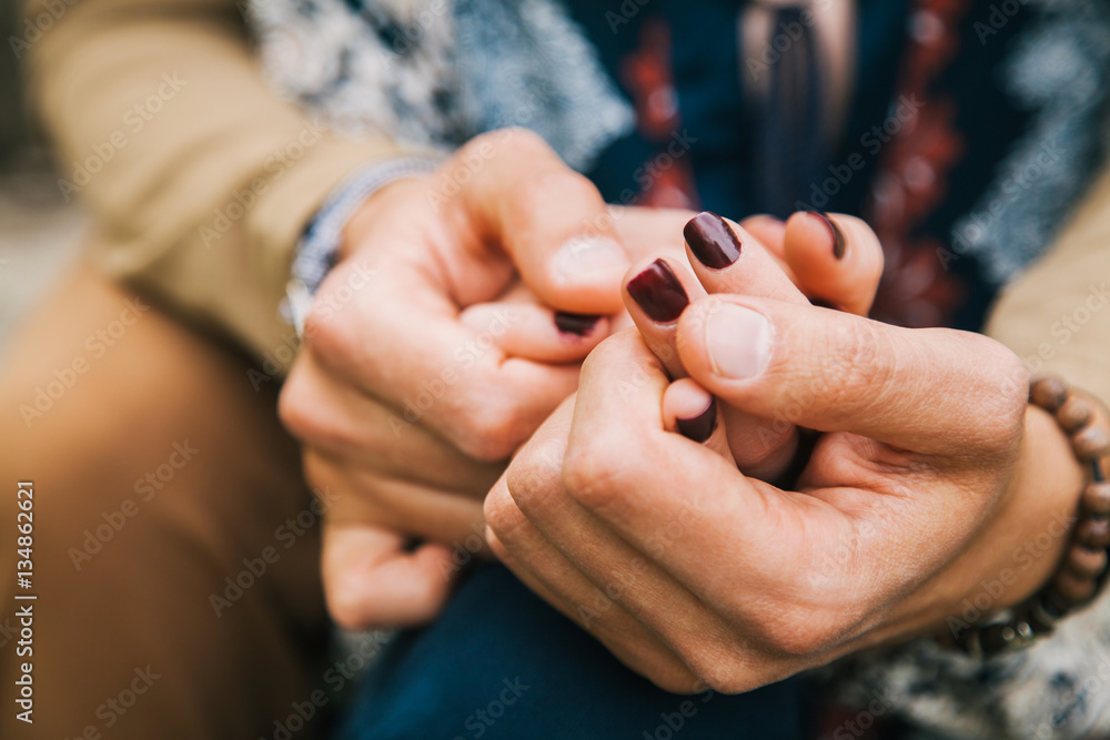 girlfriend and boyfriend holding hands