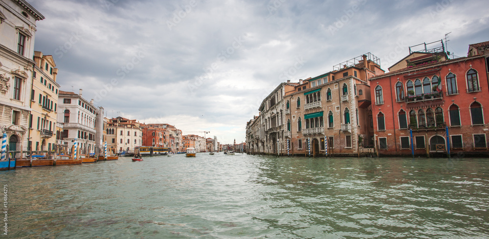 ITALY, VENICE - MAY 06, 2012: Grand Canal view. Traditional houses and boats