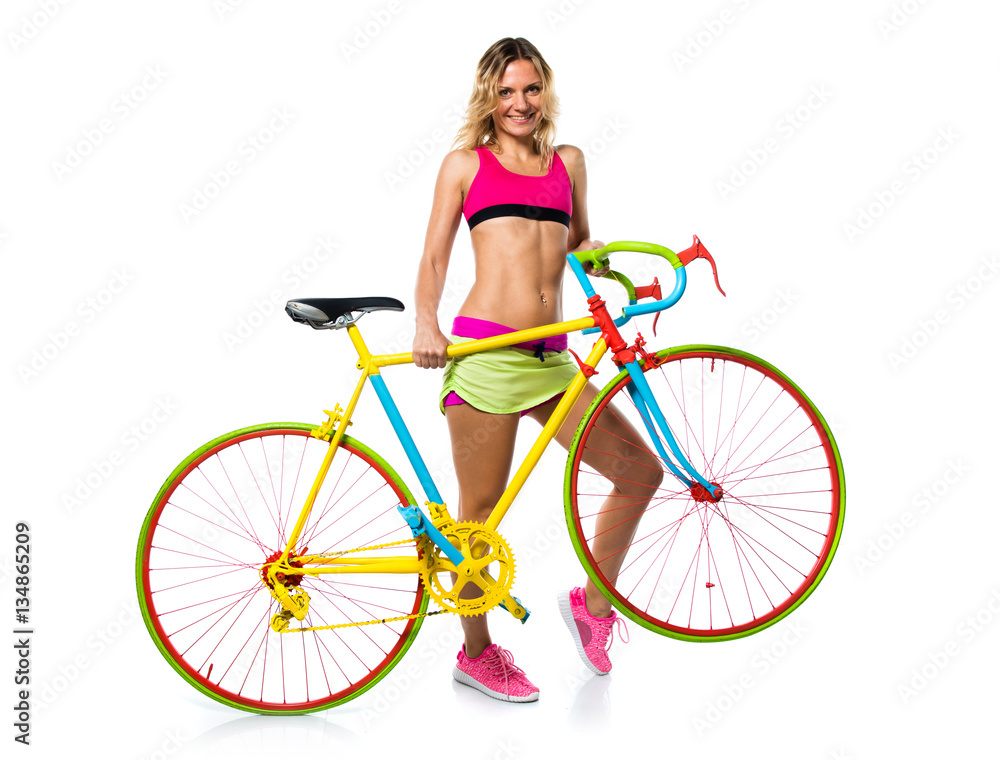 Beautiful blonde woman with colorful bike Beautiful blonde woman with colorful bike