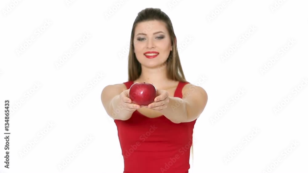 woman holding red Apple and smiling on white background. woman holding red Apple and smiling on white background.